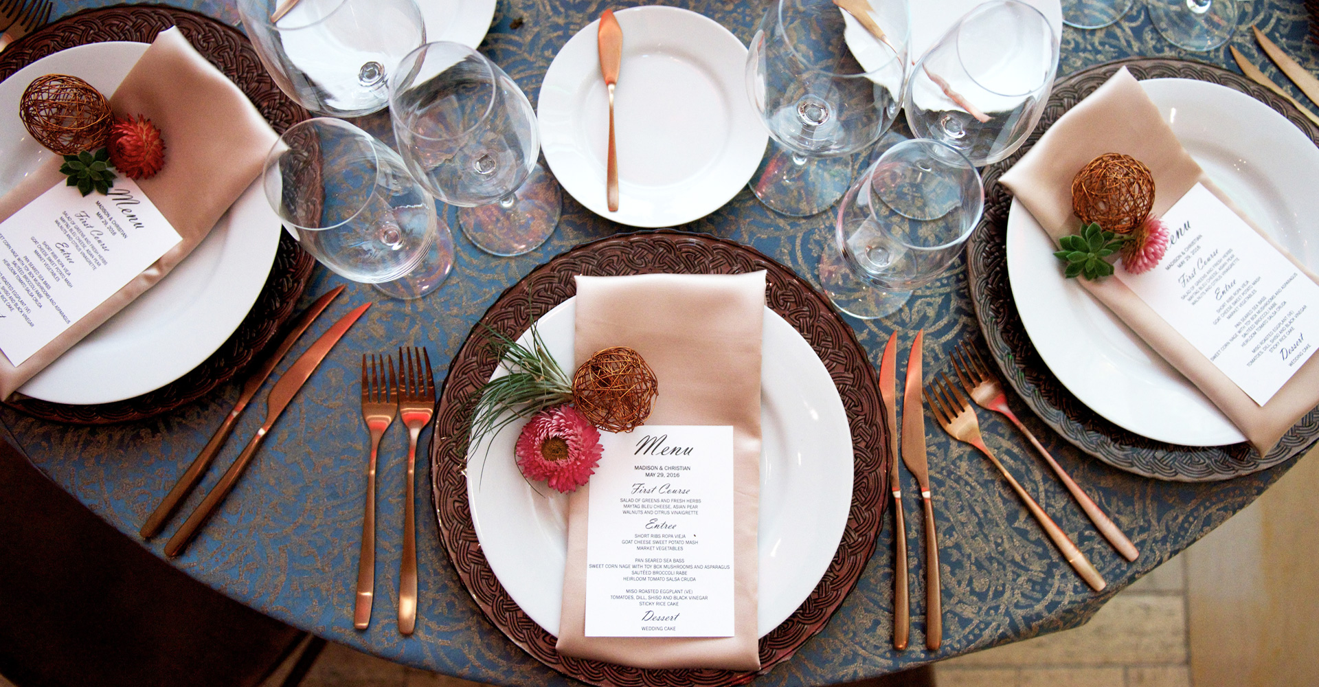 a table with plates and silverware